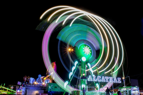 Disegni di luci su un luna park — Foto Stock