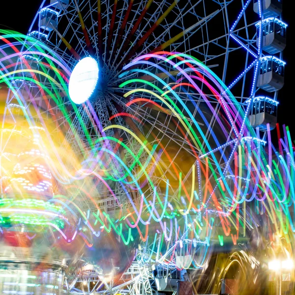 Disegni di luci e sfondo della ruota panoramica fiera — Foto Stock