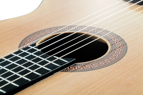 Guitarra acústica con adorno antiguo y primer plano de madera clara Fotos De Stock Sin Royalties Gratis