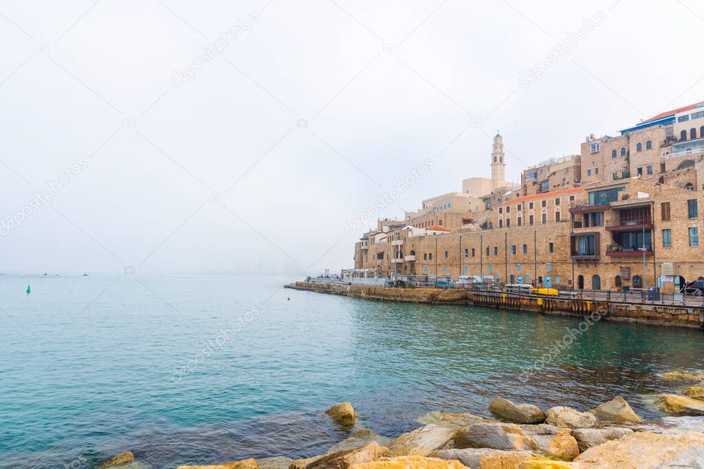 Old Jaffa Port and Tel-Aviv In fog time