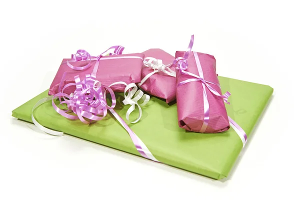 Wrapped gifts in vivid colors — Stock Photo, Image