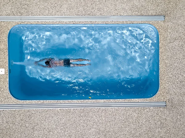 Boy Swims Pool Athlete Trains Countercurrent Wellness Resort Aerial View — Stock Photo, Image