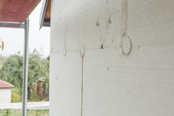 Closeup of anchoring facade polystyrene — Stock Photo, Image