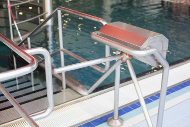 Turnstile entrance to the swimming pools. clipart