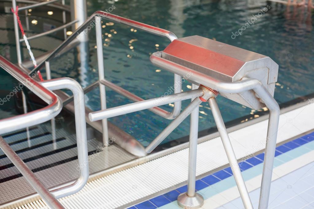 Turnstile entrance to the swimming pools.