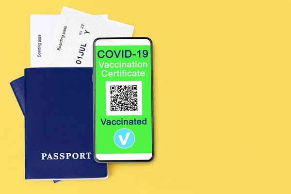 COVID 19 vaccination certificate, smartphone, digital coronavirus immunity health passport, flight boarding pass, vaccinated people travel, summer holidays, vacation, international tourism, copy space