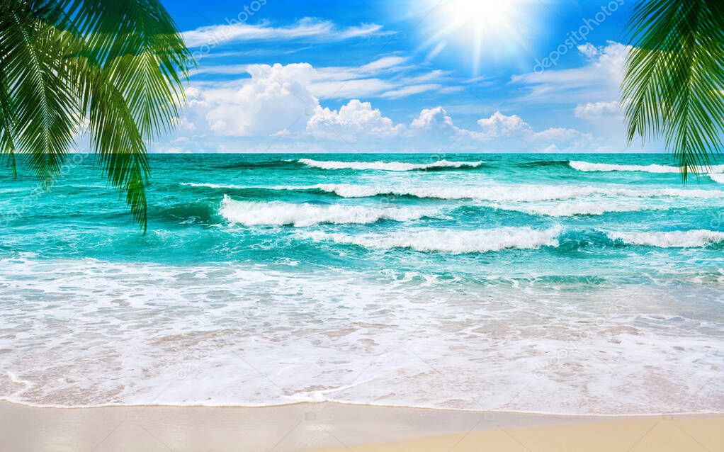 Exotic tropical paradise island sand beach, turquoise sea water ocean waves, green palm tree leaves, sun, blue sky white clouds, beautiful nature, summer holidays, caribbean vacation, travel landscape