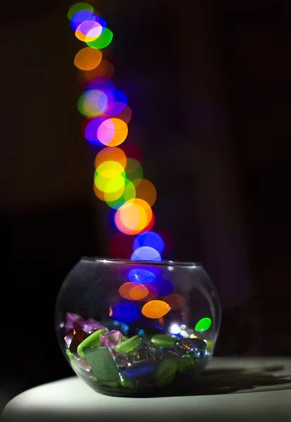 Bokeh bir cam içine inen Noel ışıklar
