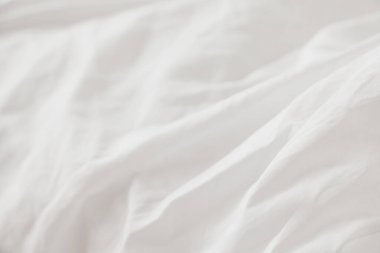 Texture of fabric is white color background,Wavy folds of cloth.	