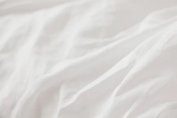 Texture of fabric is white color background,Wavy folds of cloth.	