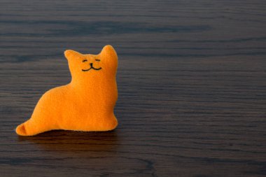 yumuşak kırmızı kedi pelüş oyuncak atışı