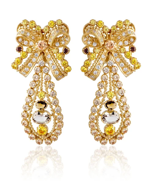 Gold earrings with gemstones — Stock Photo, Image