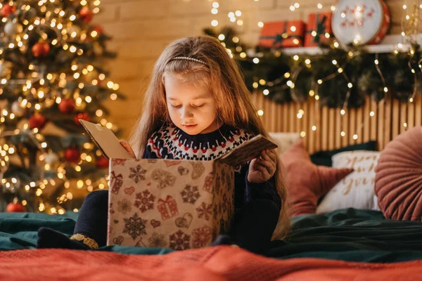 Excited Girl Opens Gift Box Santa Claus Happy Childhood Holiday — Stock Photo, Image