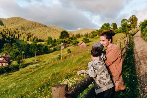 Family vacation in the mountains in summer. Enjoy the sunset in the mountains with the whole family.