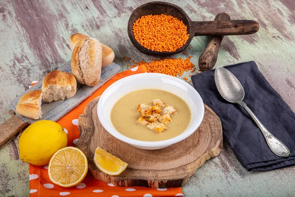 Lentil soup with kruton bread in a ceramic white bowl on a wooden background — Stock Image Lentil Soup Kruton Bread Ceramic White Bowl Wooden Background Royalty Free Stock Photos