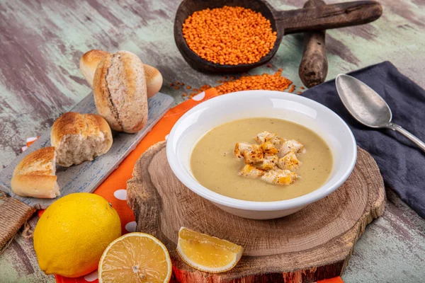 Lentil soup with kruton bread in a ceramic white bowl on a wooden background — Stock Image Lentil Soup Kruton Bread Ceramic White Bowl Wooden Background Royalty Free Stock Photos