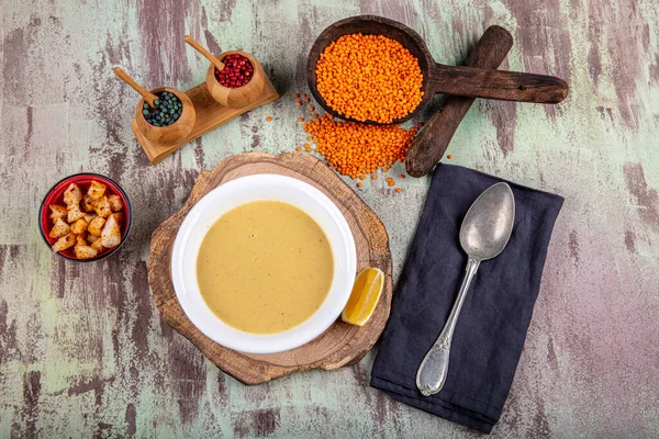 Lentil soup with kruton bread in a ceramic white bowl on a wooden background — Stock Image Lentil Soup Kruton Bread Ceramic White Bowl Wooden Background Royalty Free Stock Images