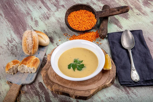 Lentil soup with kruton bread in a ceramic white bowl on a wooden background — Stock Image Lentil Soup Kruton Bread Ceramic White Bowl Wooden Background Royalty Free Stock Photos