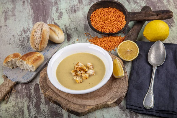 Lentil soup with kruton bread in a ceramic white bowl on a wooden background — Stock Image Lentil Soup Kruton Bread Ceramic White Bowl Wooden Background Royalty Free Stock Photos