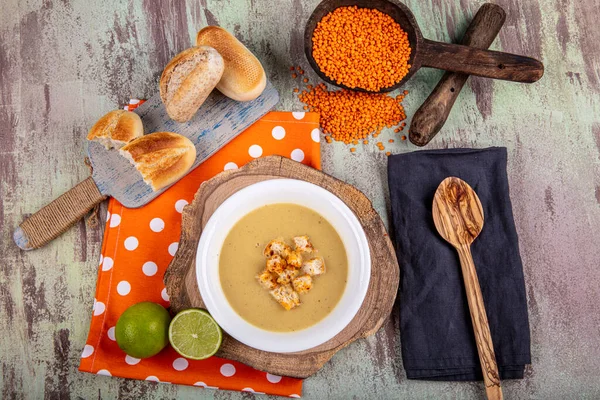 Lentil soup with kruton bread in a ceramic white bowl on a wooden background — Stock Image Lentil Soup Kruton Bread Ceramic White Bowl Wooden Background Royalty Free Stock Images