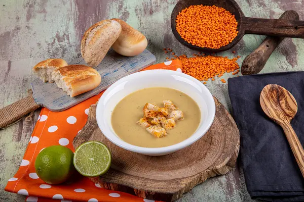 Lentil soup with kruton bread in a ceramic white bowl on a wooden background — Stock Image Lentil Soup Kruton Bread Ceramic White Bowl Wooden Background Royalty Free Stock Images