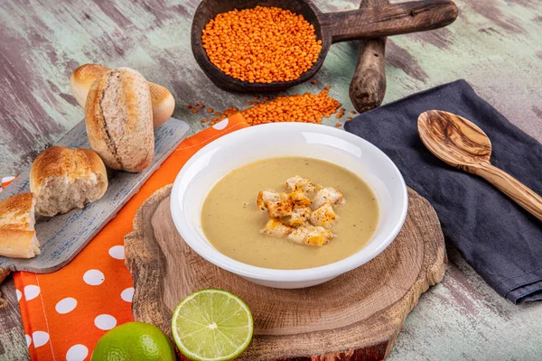 Lentil soup with kruton bread in a ceramic white bowl on a wooden background — Stock Image Lentil Soup Kruton Bread Ceramic White Bowl Wooden Background Stock Image
