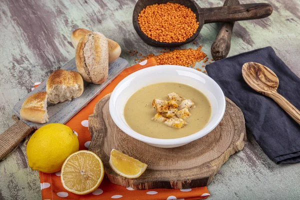 Lentil soup with kruton bread in a ceramic white bowl on a wooden background — Stock Image Lentil Soup Kruton Bread Ceramic White Bowl Wooden Background Royalty Free Stock Photos