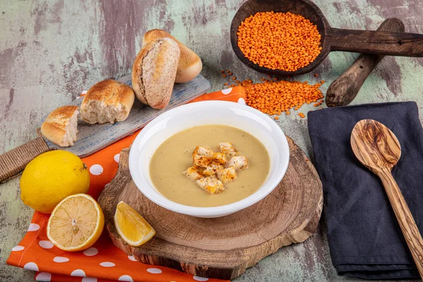 Lentil soup with kruton bread in a ceramic white bowl on a wooden background — Stock Image Lentil Soup Kruton Bread Ceramic White Bowl Wooden Background Royalty Free Stock Photos