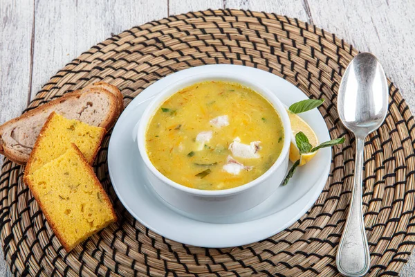 Fish soup with cream and parsley. Creamy hearty fish soup. Clean eating, healthy and diet food concept. View from above, top studio shot. — Stock Image Fish Soup Cream Parsley Creamy Hearty Fish Soup Clean Eating Stock Picture