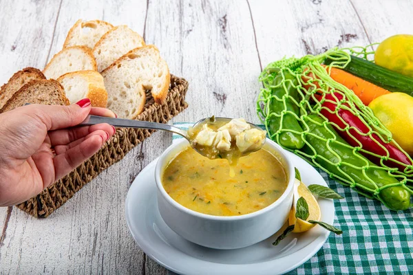 Fish soup with cream and parsley. Creamy hearty fish soup. Clean eating, healthy and diet food concept. View from above, top studio shot. — Stock Image Fish Soup Cream Parsley Creamy Hearty Fish Soup Clean Eating Stock Photo