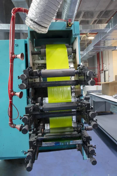 Production of duct tape.Packing tape manufacturing. Strapping Machine for Industrail Packaging Line, Modern machine for packaging line in factory, Industrial and technology concept.