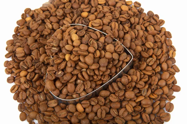 Coffee beans. Coffee beans are spread over the surface. Making different types of coffee. Coffee Background.