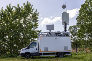 Cell on Wheels (COW) is a portable base station used to provide temporary cellular network coverage for high-profile events and emergency situations where existing base stations become damaged.