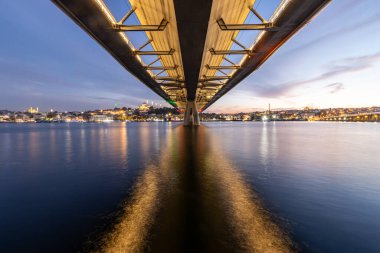 Long exposure of the Golden Horn Metro Bridge under the sunset. Golden Horn Metro Bridge in Blue Hours.