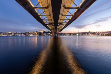 Long exposure of the Golden Horn Metro Bridge under the sunset. Golden Horn Metro Bridge in Blue Hours.