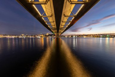 Long exposure of the Golden Horn Metro Bridge under the sunset. Golden Horn Metro Bridge in Blue Hours.