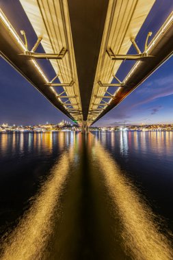 Long exposure of the Golden Horn Metro Bridge under the sunset. Golden Horn Metro Bridge in Blue Hours.
