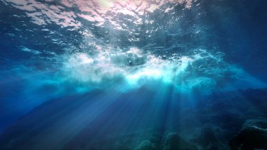 Işık huzmesindeki dalgaların güzel ve şaşırtıcı sualtı fotoğrafı. Atlantik Okyanusu 'ndaki Kanarya Adaları' ndaki bir dalıştan.