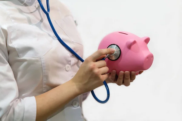 Close Female Doctor Holding Stethoscope Listening Beautiful Pink Piggy Bank — Stock Photo, Image