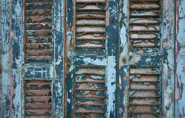 Weathered blue shutters — Stock Photo, Image