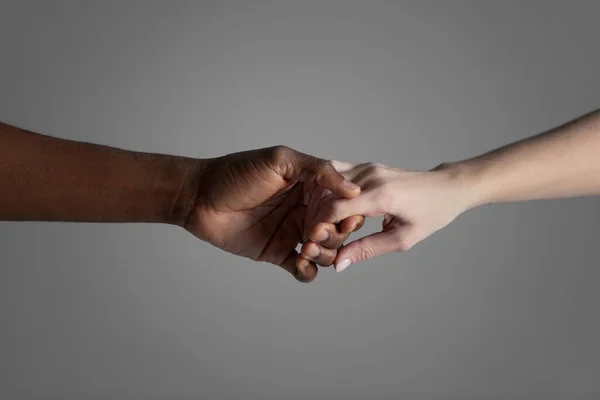 Hands of male and female holding together. — Stock Photo, Image