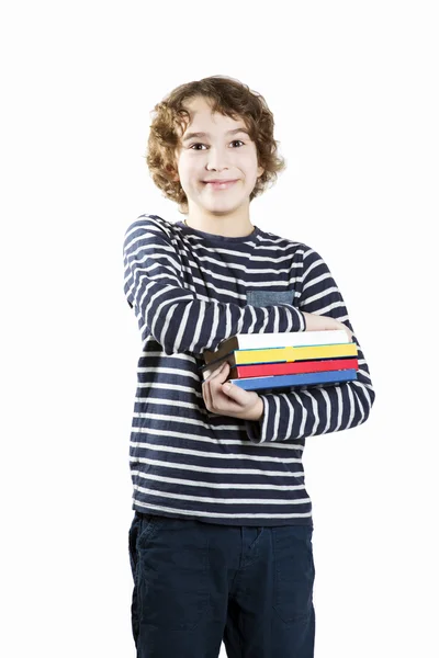 Pojken håller böcker — Stockfoto