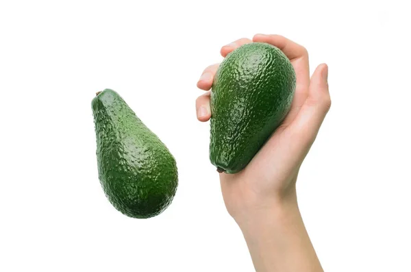 Avocado fruit in hand - raw healthy organic food — Stock Photo, Image