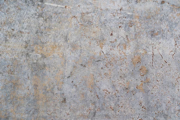 Skadad grunge sten konsistens bakgrund med rostig metall utseende — Stockfoto