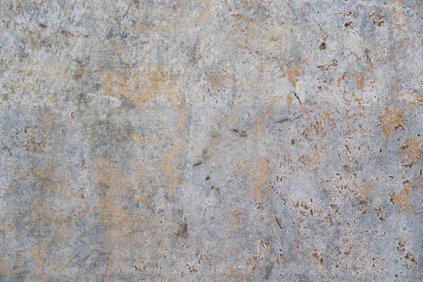 Skadad grunge sten konsistens bakgrund med rostig metall utseende — Stockfoto