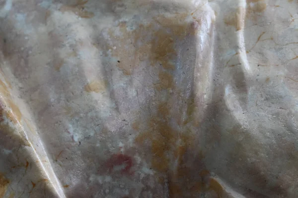 Arkaplan için beyaz ve bej mermer bir yüzey