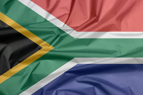南アフリカの生地の旗 三角形に対して黒の三角形 白と緑の水平Yと金と南アフリカの国旗の背景 赤と青の増加 — ストック写真