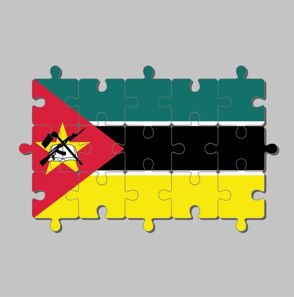 Puzzle Von Mosambik Flagge Grün Schwarz Gelb Und Klein Weiß — Stockvektor