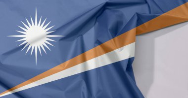 Marshall Adaları kumaş krep ve beyaz boşluk ile kat kat, iki çapraz çizgili bir mavi alan turuncu ve beyaz ve büyük beyaz yıldız.