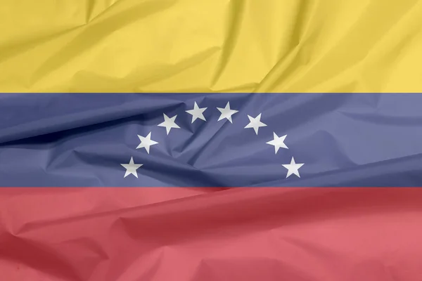 Флаг Венесуэлы Складки Венесуэльского Флага Фон Желтый Синий Красный Дугой — стоковое фото